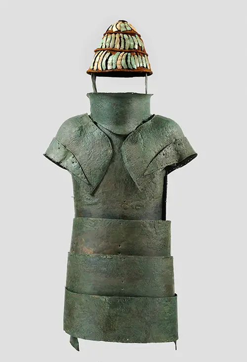 Oxidised bronze armour found in Dendra Greece and a helmet decorated with ivory